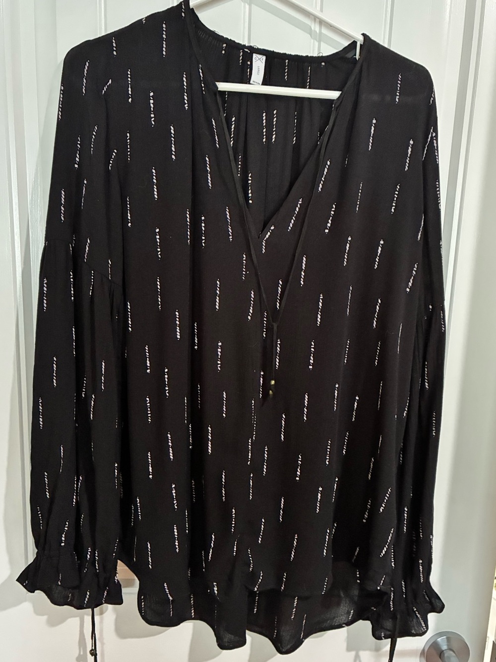 Gentle Fawn Black V-Neck Long-Sleeve Blouse with Subtle Stripe